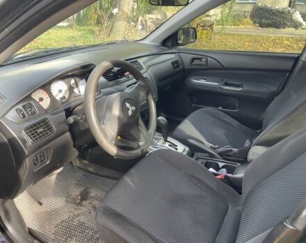 Міцубісі Lancer 2007 у Каневе на Automoto.ua Чорний Міцубісі Lancer, об'ємом двигуна 1.6 л та пробігом 310 тис. км за 4100 $, фото 12 на Automoto.ua