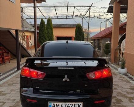 Черный Мицубиси Лансер, объемом двигателя 2 л и пробегом 247 тыс. км за 4700 $, фото 5 на Automoto.ua