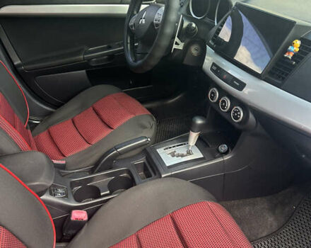 Черный Мицубиси Лансер, объемом двигателя 2 л и пробегом 208 тыс. км за 6500 $, фото 10 на Automoto.ua