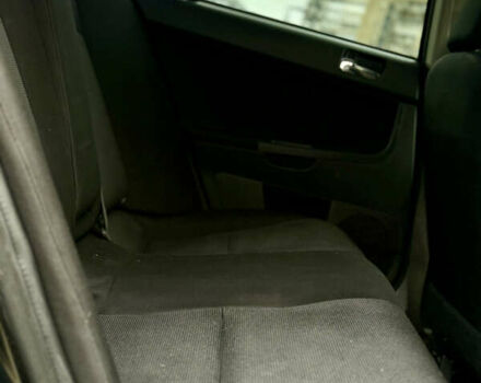 Черный Мицубиси Лансер, объемом двигателя 2 л и пробегом 215 тыс. км за 5500 $, фото 15 на Automoto.ua