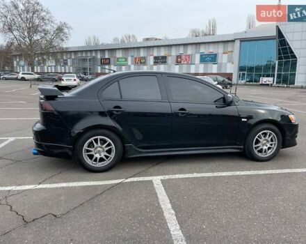 Черный Мицубиси Лансер, объемом двигателя 2 л и пробегом 246 тыс. км за 7500 $, фото 6 на Automoto.ua