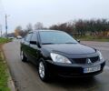 Чорний Міцубісі Lancer, об'ємом двигуна 1.6 л та пробігом 240 тис. км за 4700 $, фото 1 на Automoto.ua
