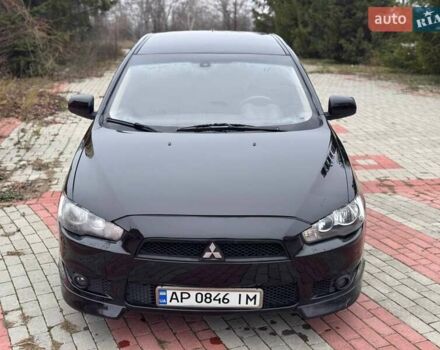 Черный Мицубиси Лансер, объемом двигателя 2 л и пробегом 217 тыс. км за 5500 $, фото 1 на Automoto.ua