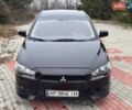 Черный Мицубиси Лансер, объемом двигателя 2 л и пробегом 217 тыс. км за 5500 $, фото 1 на Automoto.ua