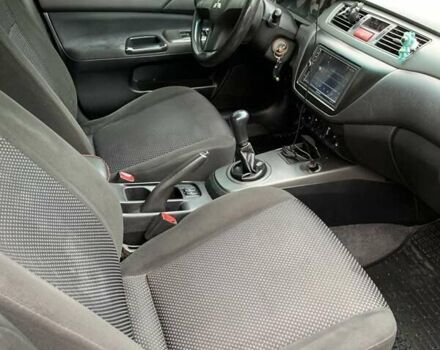 Черный Мицубиси Лансер, объемом двигателя 1.6 л и пробегом 164 тыс. км за 5200 $, фото 9 на Automoto.ua