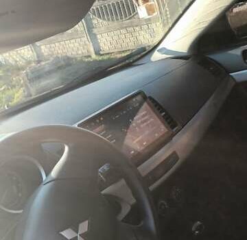 Черный Мицубиси Лансер, объемом двигателя 1.5 л и пробегом 270 тыс. км за 4999 $, фото 2 на Automoto.ua