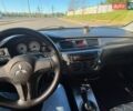 Черный Мицубиси Лансер, объемом двигателя 1.58 л и пробегом 237 тыс. км за 3999 $, фото 1 на Automoto.ua