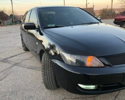 Чорний Міцубісі Lancer, об'ємом двигуна 0.16 л та пробігом 220 тис. км за 4500 $, фото 12 на Automoto.ua