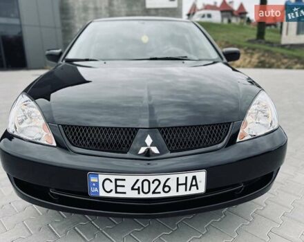 Чорний Міцубісі Lancer, об'ємом двигуна 1.6 л та пробігом 243 тис. км за 4950 $, фото 16 на Automoto.ua