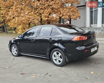 Міцубісі Lancer 2007 у Києві на Automoto.ua Чорний Міцубісі Lancer, об'ємом двигуна 2 л та пробігом 115 тис. км за 5000 $, фото 5 на Automoto.ua