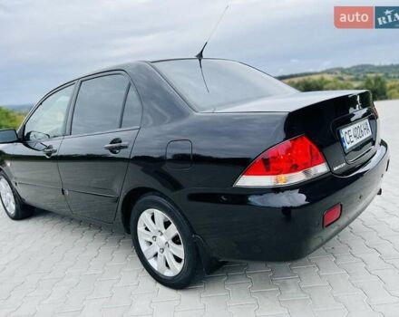 Чорний Міцубісі Lancer, об'ємом двигуна 1.6 л та пробігом 243 тис. км за 4950 $, фото 8 на Automoto.ua