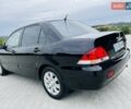 Чорний Міцубісі Lancer, об'ємом двигуна 1.6 л та пробігом 243 тис. км за 4950 $, фото 8 на Automoto.ua