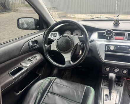 Чорний Міцубісі Lancer, об'ємом двигуна 2 л та пробігом 210 тис. км за 5500 $, фото 24 на Automoto.ua