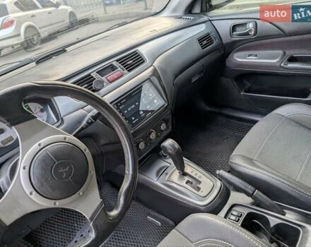 Чорний Міцубісі Lancer, об'ємом двигуна 2 л та пробігом 152 тис. км за 5500 $, фото 16 на Automoto.ua