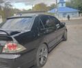Міцубісі Lancer 2007 у Кам'янське (Дніпродзержинськ) на Automoto.ua Чорний Міцубісі Lancer, об'ємом двигуна 2 л та пробігом 268 тис. км за 5999 $, фото 4 на Automoto.ua