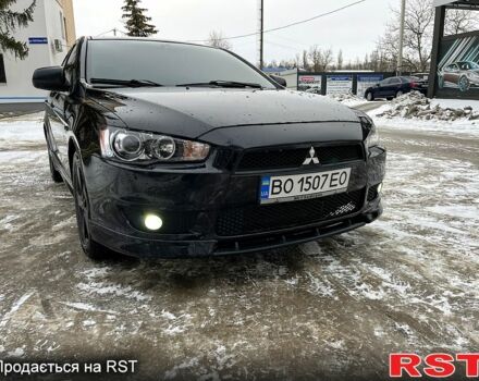 Чорний Міцубісі Lancer, об'ємом двигуна 2 л та пробігом 255 тис. км за 6600 $, фото 3 на Automoto.ua