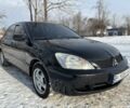 Чорний Міцубісі Lancer, об'ємом двигуна 1.6 л та пробігом 181 тис. км за 4350 $, фото 1 на Automoto.ua
