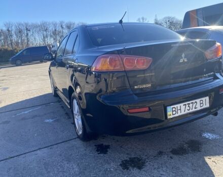 Черный Мицубиси Лансер, объемом двигателя 2 л и пробегом 372 тыс. км за 6200 $, фото 4 на Automoto.ua