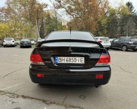 Черный Мицубиси Лансер, объемом двигателя 1.6 л и пробегом 173 тыс. км за 4700 $, фото 3 на Automoto.ua