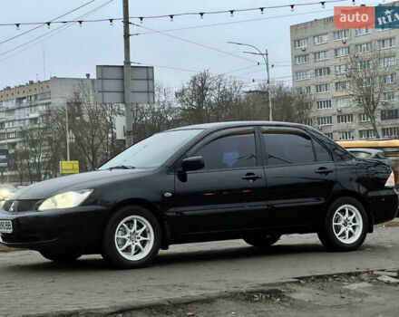 Чорний Міцубісі Lancer, об'ємом двигуна 1.6 л та пробігом 303 тис. км за 4350 $, фото 5 на Automoto.ua