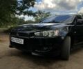 Черный Мицубиси Лансер, объемом двигателя 2 л и пробегом 230 тыс. км за 5860 $, фото 1 на Automoto.ua