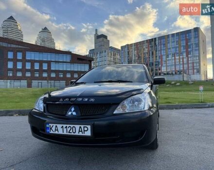 Черный Мицубиси Лансер, объемом двигателя 1.58 л и пробегом 237 тыс. км за 3999 $, фото 15 на Automoto.ua