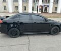 Черный Мицубиси Лансер, объемом двигателя 2 л и пробегом 196 тыс. км за 6300 $, фото 4 на Automoto.ua