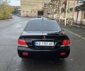 Мицубиси Лансер 2007 в Кривом Роге на Automoto.ua Черный Мицубиси Лансер, объемом двигателя 1.6 л и пробегом 200 тыс. км за 4900 $, фото 1 на Automoto.ua