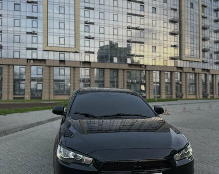 Черный Мицубиси Лансер, объемом двигателя 2 л и пробегом 245 тыс. км за 6200 $, фото 2 на Automoto.ua