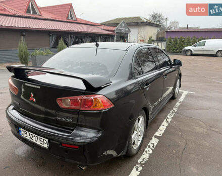 Чорний Міцубісі Lancer, об'ємом двигуна 2 л та пробігом 281 тис. км за 6000 $, фото 8 на Automoto.ua
