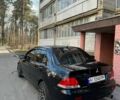Черный Мицубиси Лансер, объемом двигателя 1.6 л и пробегом 211 тыс. км за 5600 $, фото 1 на Automoto.ua