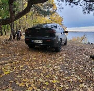 Черный Мицубиси Лансер, объемом двигателя 2 л и пробегом 260 тыс. км за 5500 $, фото 3 на Automoto.ua