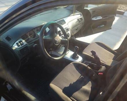 Чорний Міцубісі Lancer, об'ємом двигуна 1.59 л та пробігом 180 тис. км за 4999 $, фото 12 на Automoto.ua