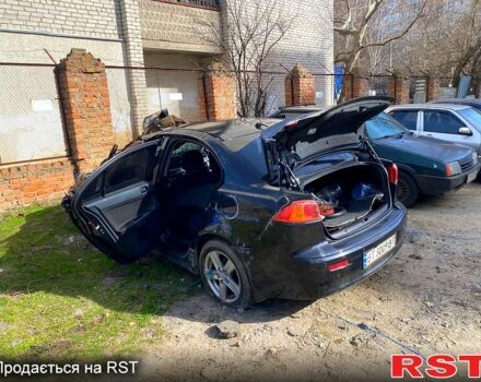 Чорний Міцубісі Lancer, об'ємом двигуна 2 л та пробігом 1 тис. км за 1500 $, фото 1 на Automoto.ua