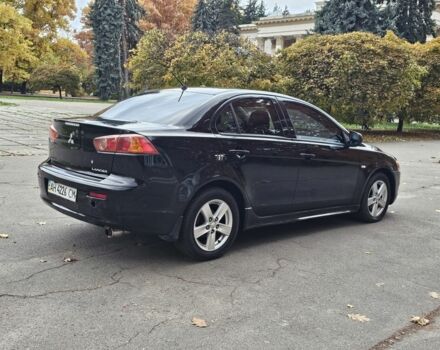 Черный Мицубиси Лансер, объемом двигателя 2 л и пробегом 115 тыс. км за 5000 $, фото 6 на Automoto.ua