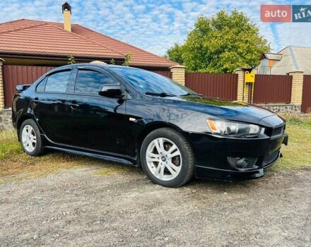 Чорний Міцубісі Lancer, об'ємом двигуна 2 л та пробігом 284 тис. км за 6200 $, фото 2 на Automoto.ua