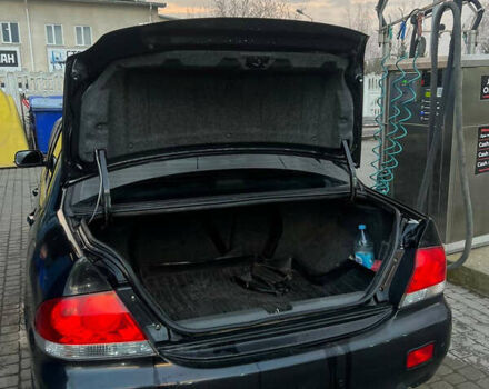 Черный Мицубиси Лансер, объемом двигателя 1.6 л и пробегом 180 тыс. км за 3499 $, фото 8 на Automoto.ua