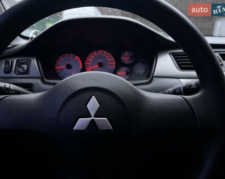 Чорний Міцубісі Lancer, об'ємом двигуна 1.6 л та пробігом 303 тис. км за 4350 $, фото 29 на Automoto.ua