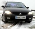 Чорний Міцубісі Lancer, об'ємом двигуна 1.6 л та пробігом 230 тис. км за 4700 $, фото 1 на Automoto.ua
