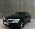 Чорний Міцубісі Lancer, об'ємом двигуна 1.58 л та пробігом 133 тис. км за 3999 $, фото 1 на Automoto.ua