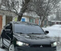 Чорний Міцубісі Lancer, об'ємом двигуна 2 л та пробігом 182 тис. км за 6999 $, фото 1 на Automoto.ua