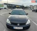 Чорний Міцубісі Lancer, об'ємом двигуна 1.58 л та пробігом 292 тис. км за 2900 $, фото 1 на Automoto.ua