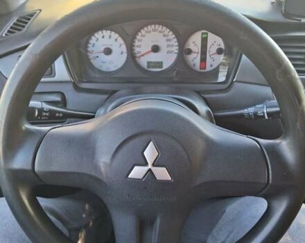 Міцубісі Lancer 2007 у Чернівцях на Automoto.ua Чорний Міцубісі Lancer, об'ємом двигуна 1.58 л та пробігом 247 тис. км за 4300 $, фото 10 на Automoto.ua