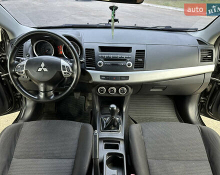 Чорний Міцубісі Lancer, об'ємом двигуна 2 л та пробігом 192 тис. км за 6500 $, фото 27 на Automoto.ua