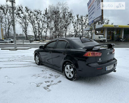 Чорний Міцубісі Lancer, об'ємом двигуна 2 л та пробігом 199 тис. км за 7000 $, фото 7 на Automoto.ua