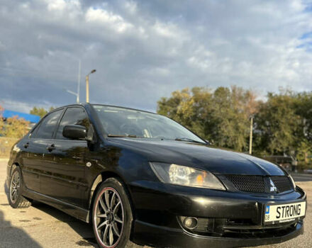 Чорний Міцубісі Lancer, об'ємом двигуна 2 л та пробігом 280 тис. км за 4600 $, фото 4 на Automoto.ua