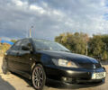 Чорний Міцубісі Lancer, об'ємом двигуна 2 л та пробігом 280 тис. км за 4600 $, фото 4 на Automoto.ua