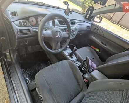 Чорний Міцубісі Lancer, об'ємом двигуна 1.6 л та пробігом 366 тис. км за 3500 $, фото 12 на Automoto.ua