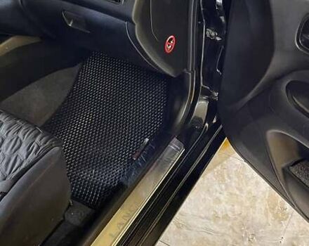 Черный Мицубиси Лансер, объемом двигателя 1.6 л и пробегом 249 тыс. км за 5000 $, фото 14 на Automoto.ua