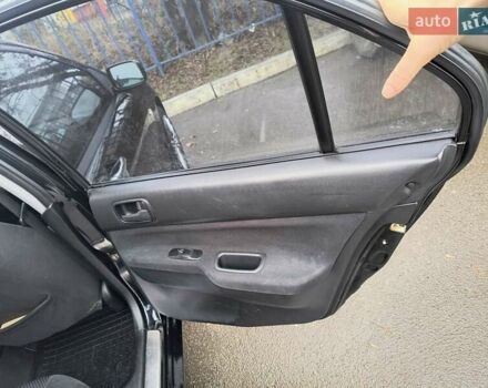 Черный Мицубиси Лансер, объемом двигателя 1.6 л и пробегом 309 тыс. км за 4000 $, фото 21 на Automoto.ua